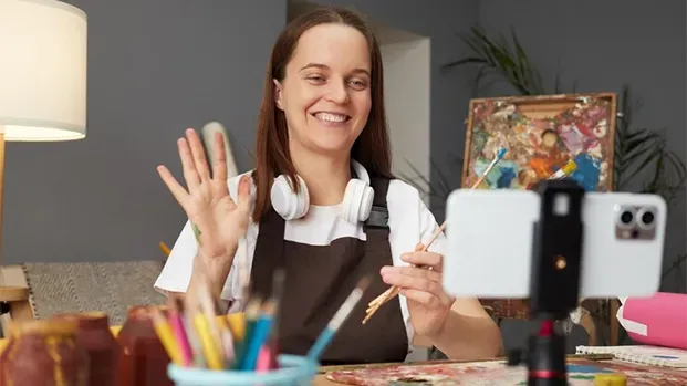 influencer lady waving at viewers