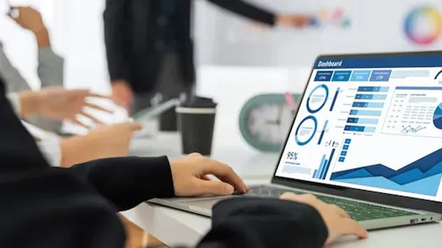 marketing agency designing campaign in laptop