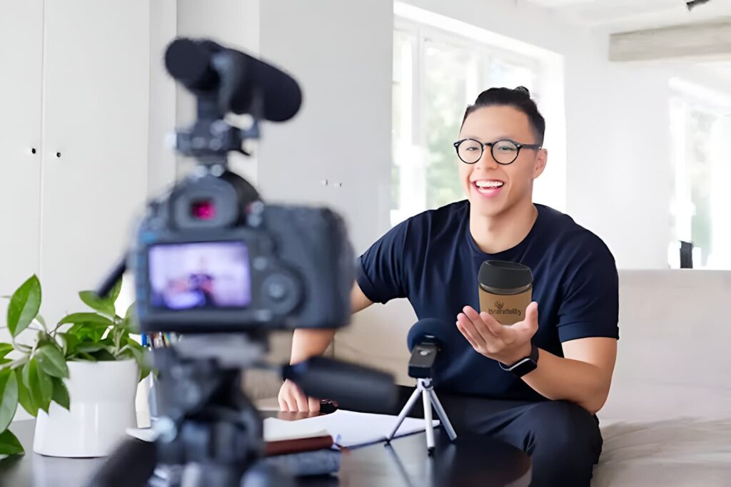 Digital creator recording video with a camera and microphone at home